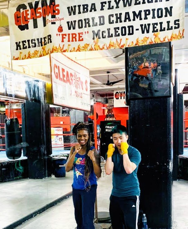 Posing with Boxing Flyweight Champion Keisher 'Fire' McLeod-Wells